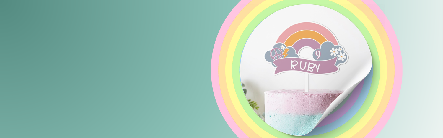 Custom cake topper upon a rainbow cake showing a uv printed cake topper with clouds and daisys.  Made in Auckland