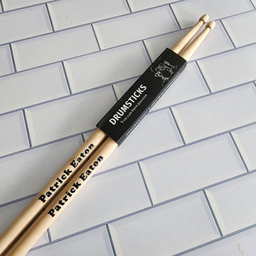 Custom printed drumsticks with a name on them