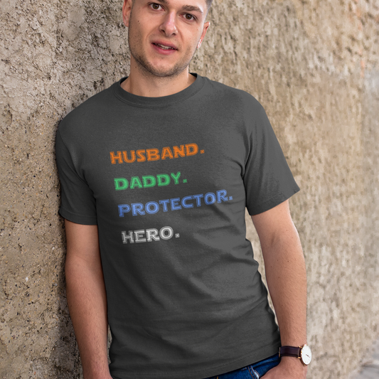 man-looking-to-the-camera-wearing-a-husband-daddy-protector-hero-tshirt