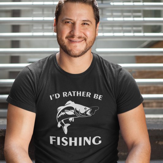middle-aged-white-man-wearing-a-t-shirt-that-says-I'd-rather-be-fishing
