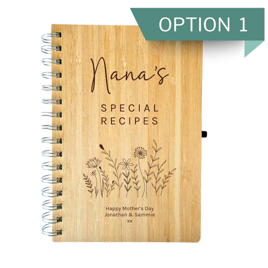 Option 1 for an engraved bamboo recipe book with a pen, featuring a natural bamboo cover with personalized text that reads 'Nana's Special Recipes' and is dated Mother's Day by Jonathan & Sammie.'.