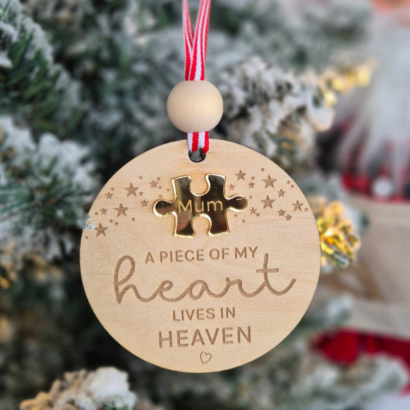 Wooden ornament with puzzle piece design on a Christmas tree