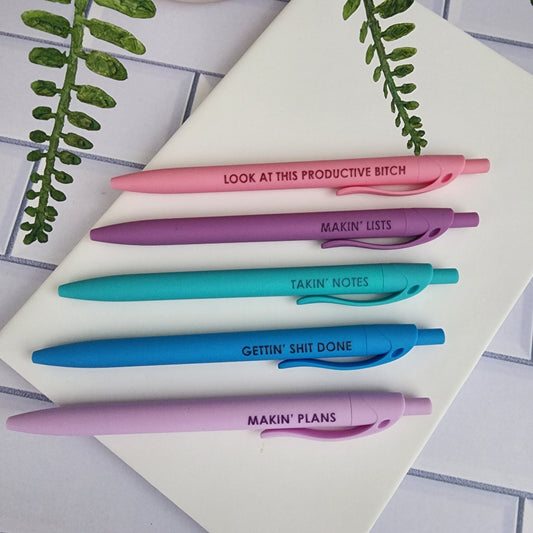 Sassy Productivity Pen Set of 5 soft touch pens with funny sayings on a white tile background